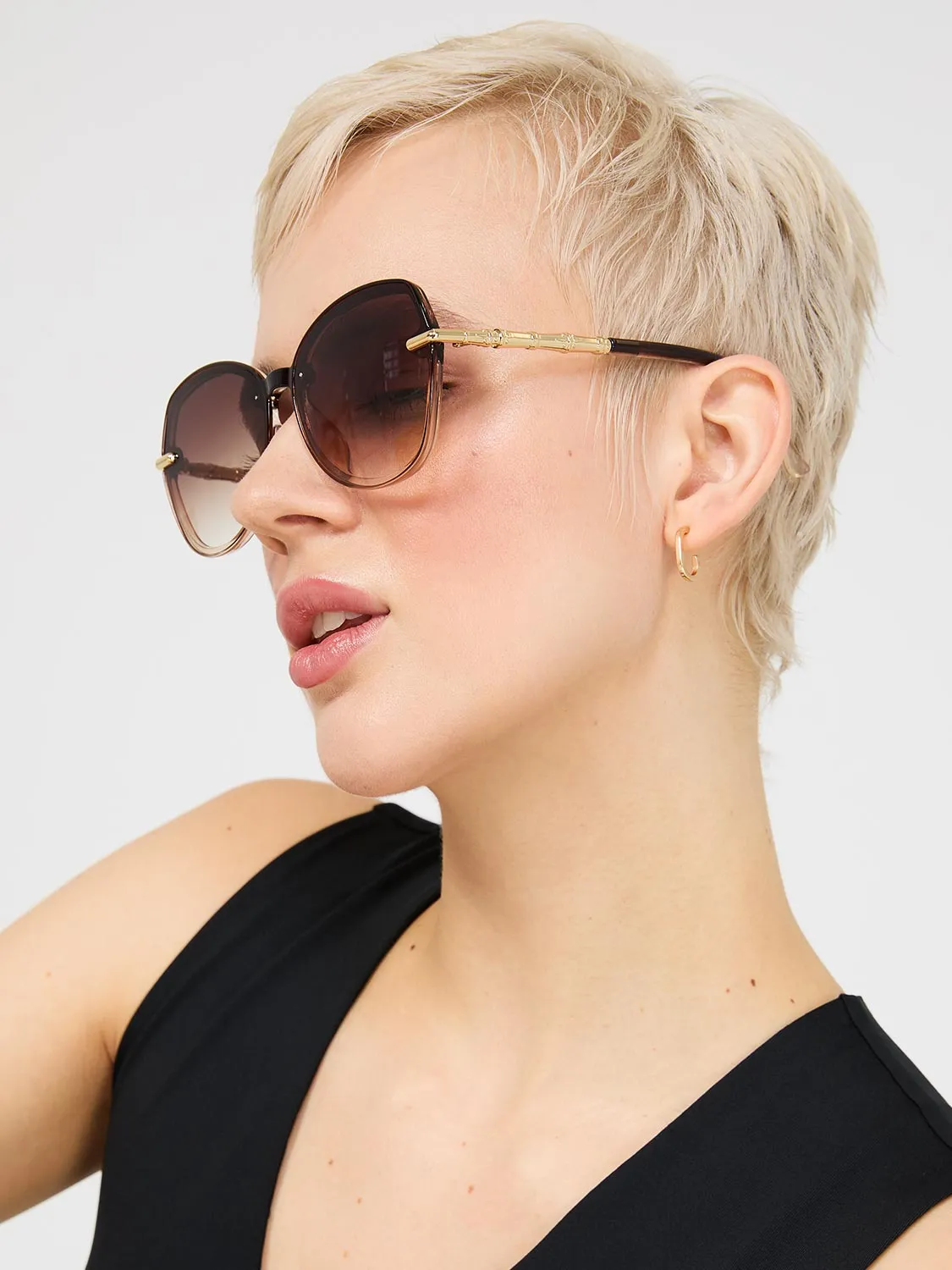 Clear Frame Round Sunglasses With Gold Details