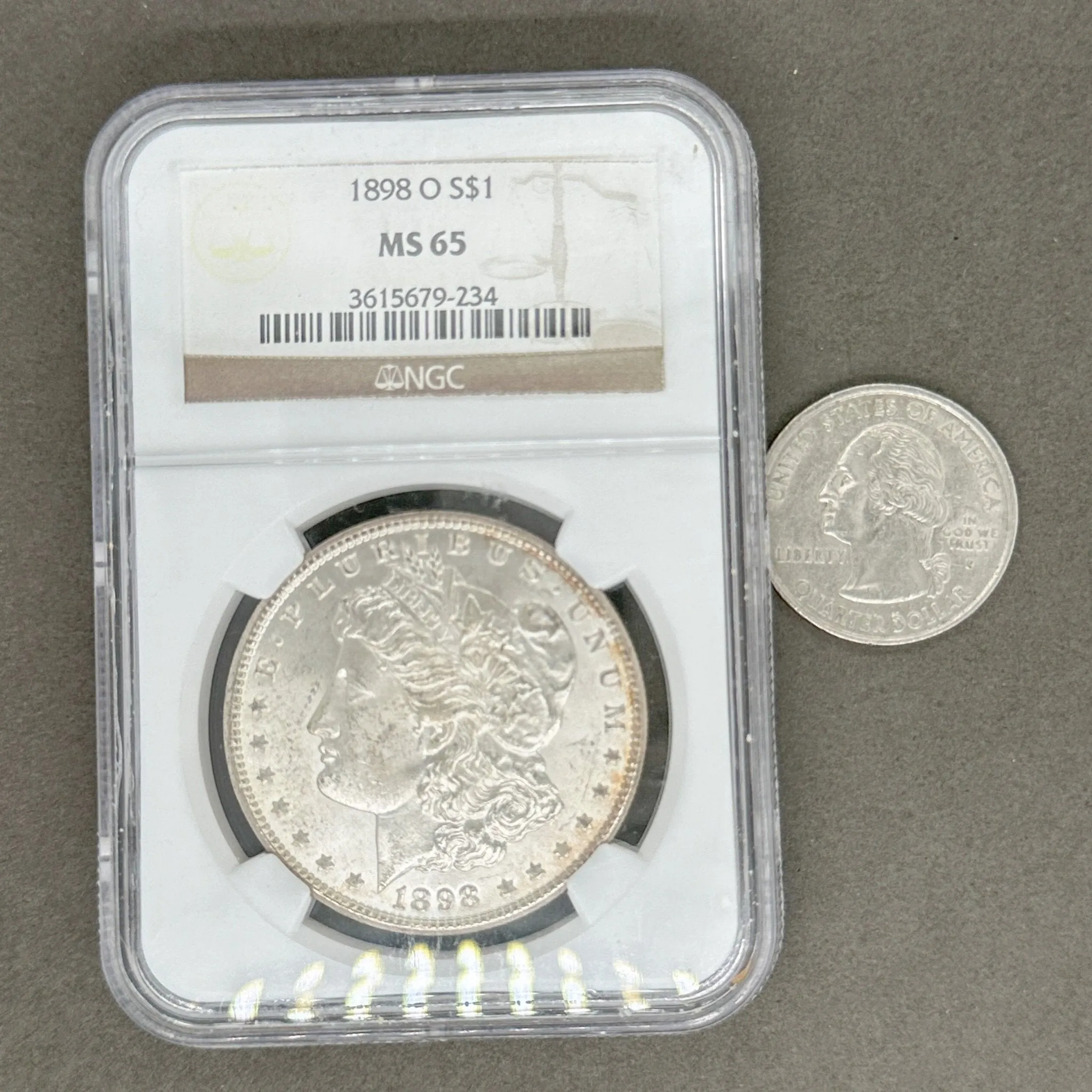 Estate 0.900 Fine Silver 1898 O $1 Morgan Dollar NGC MS65