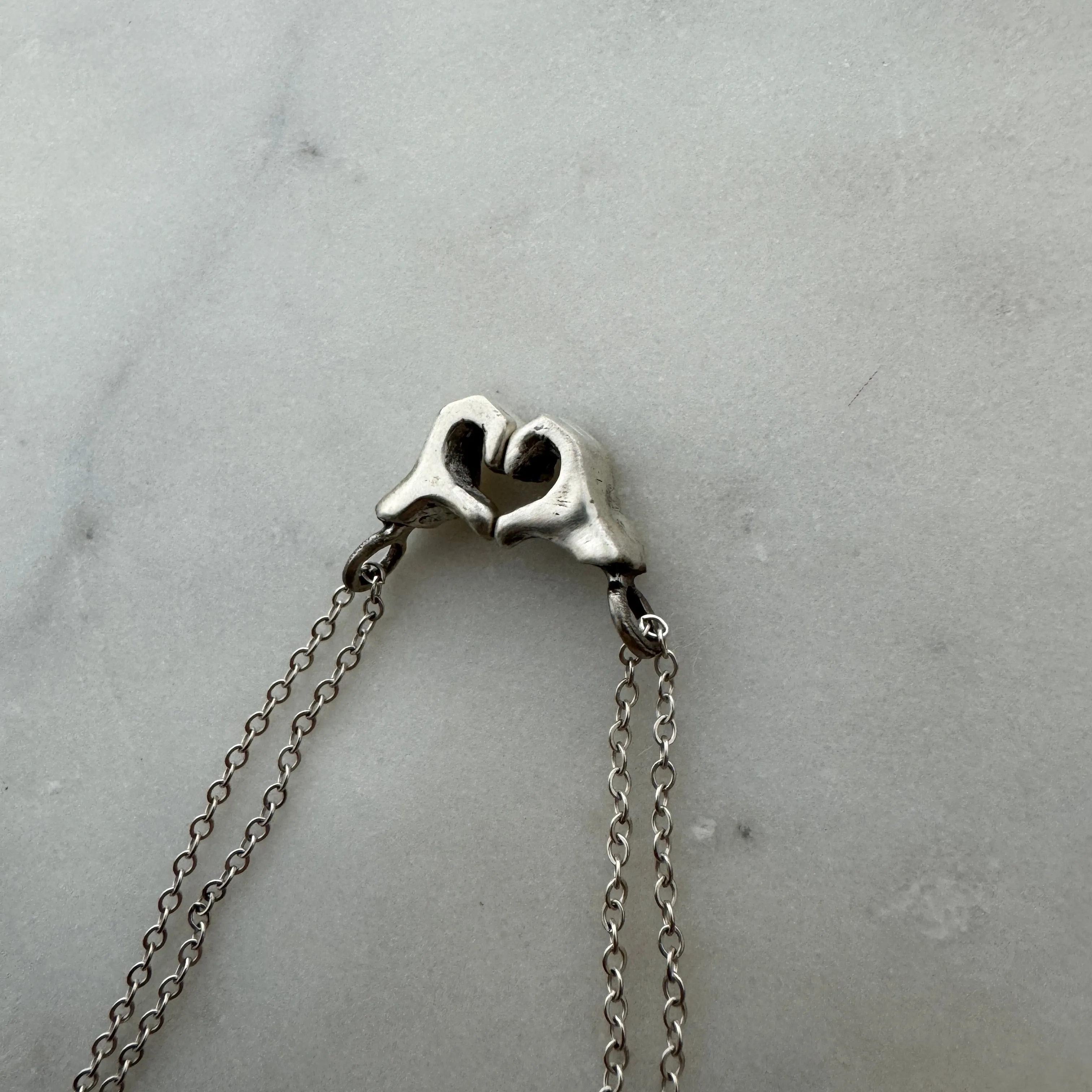 HEART HAND PENDANTS