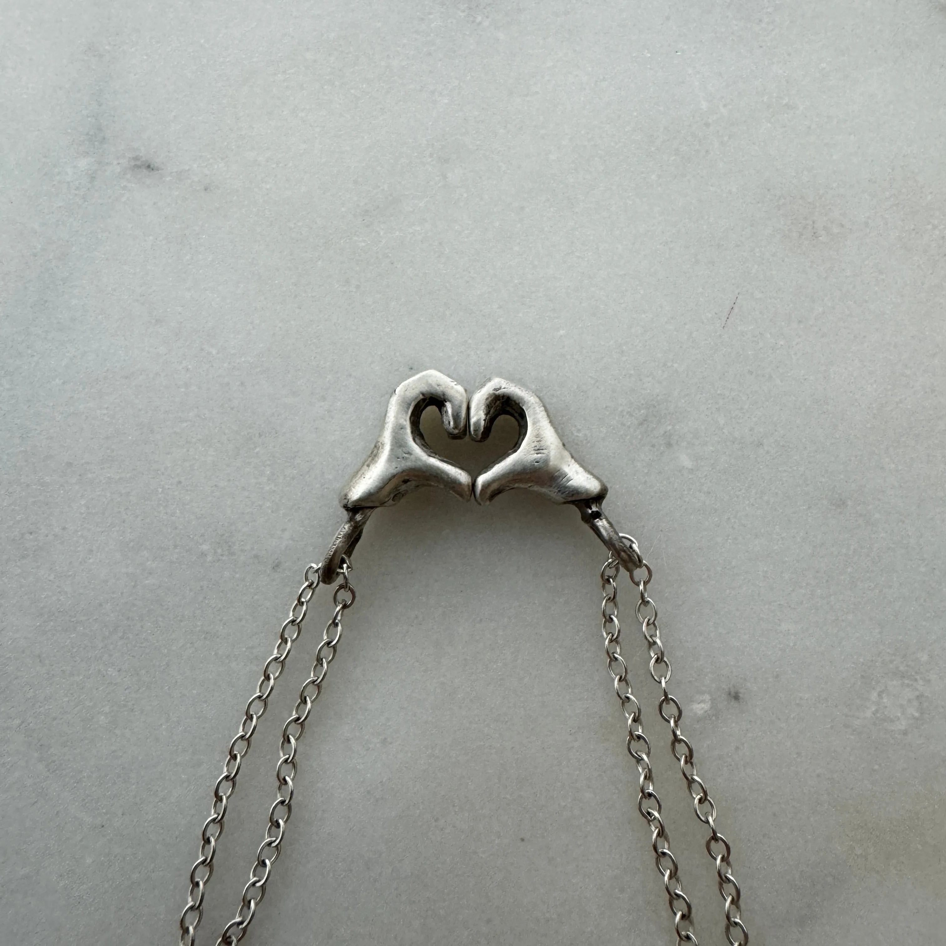 HEART HAND PENDANTS