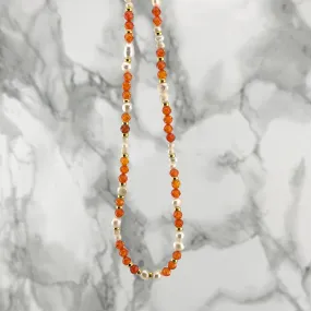 Orange beads pearl