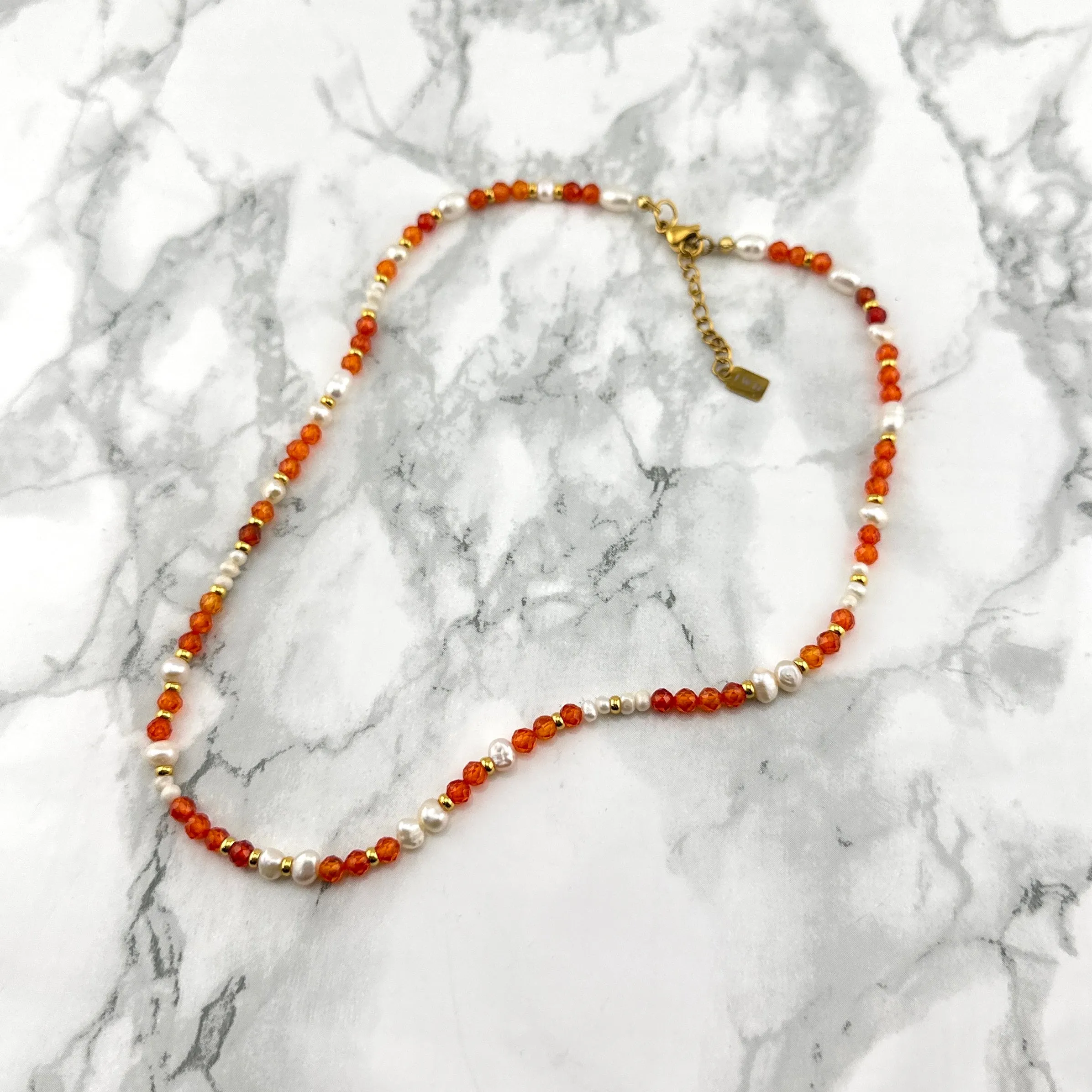 Orange beads pearl